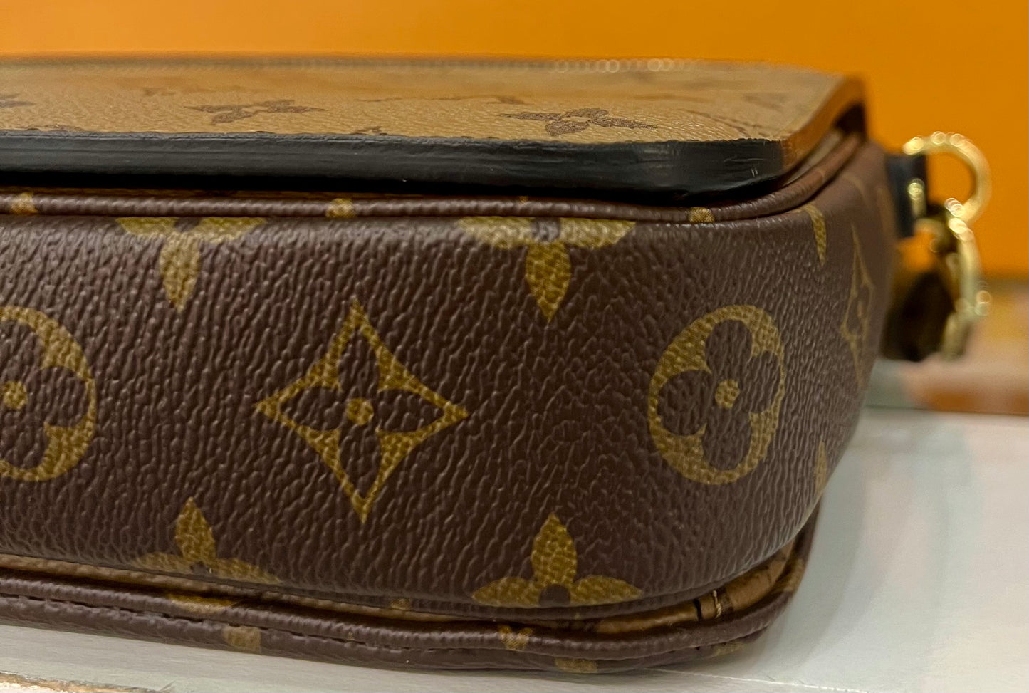 Metis Pochette Reverse Monogram