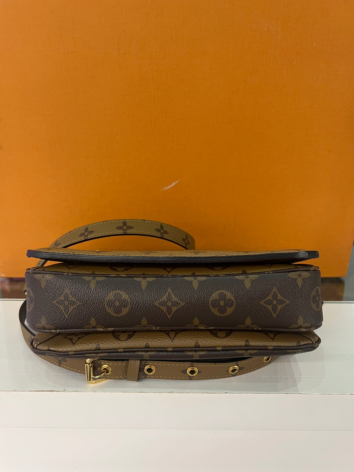 Metis Pochette Reverse Monogram