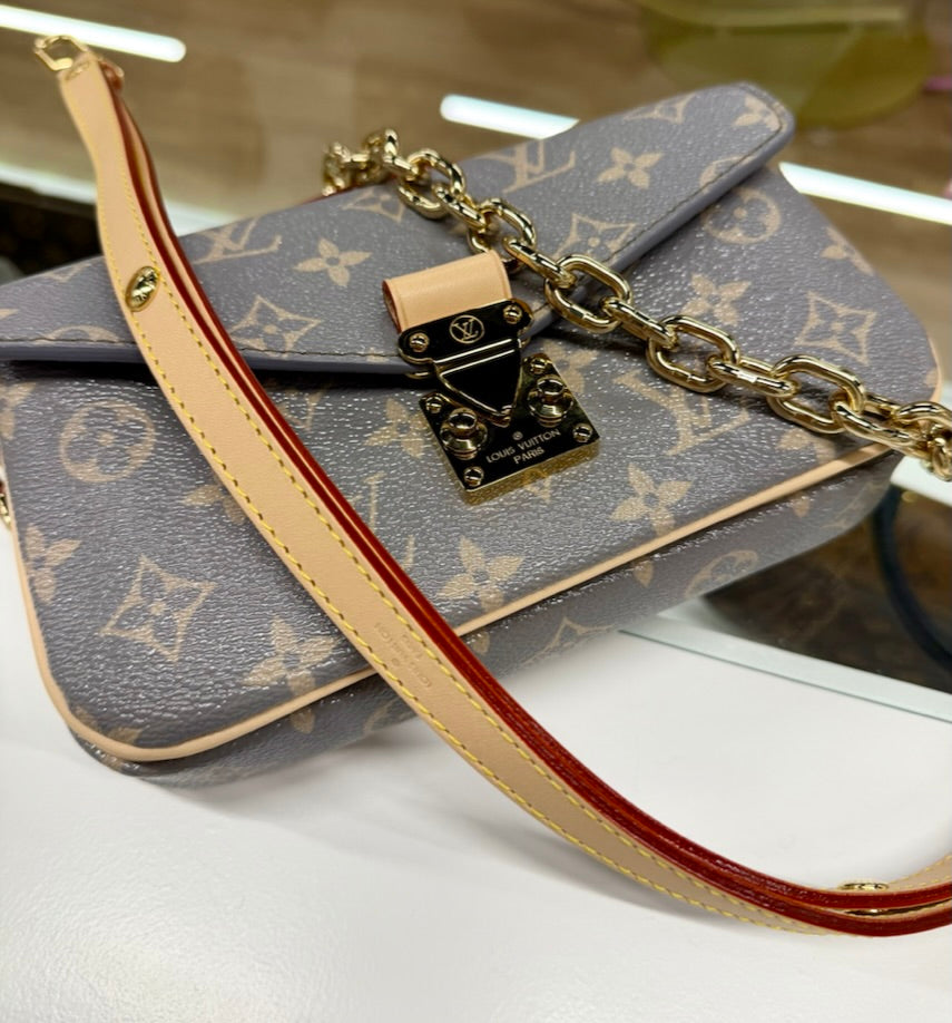 Pochette Metis East West