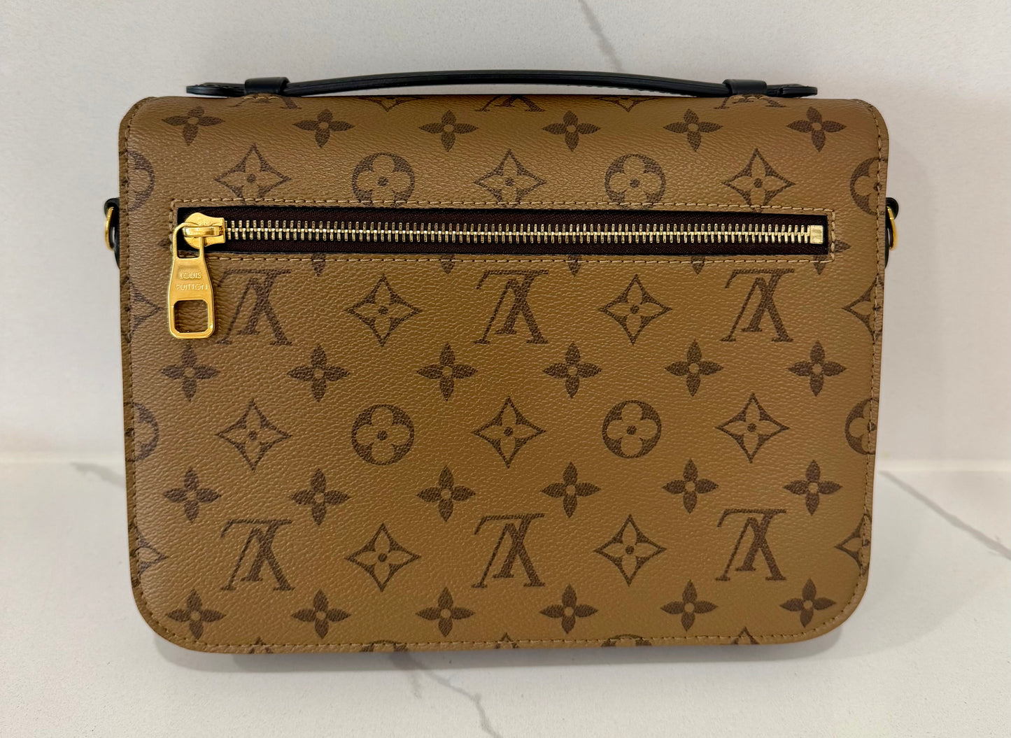 Metis Pochette Reverse Monogram